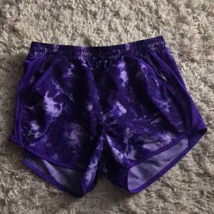 Purple under armor athletic shorts.